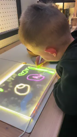 Working on our new light board…they are fascinated by the way their marks light up.  I highly recommend adding this to your classroom. 💡💡 #rushlessplaymore #familychildcare #childcareprovider #inhomedaycare #playisenough #ohhappyday #lightplay #markmaking 