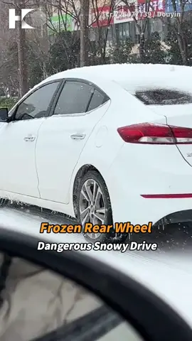 Driver shocked as car's rear tire freezed solid on icy road. #Winter #Driving #ice #cars #hkeye