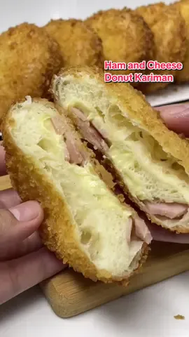 Ham & Cheese Donut Kariman #recipe⤵️ ✔️Dough 1 whole egg (large) 2 tsp instant dry yeast (6g) 3 tbsp sugar (38g) 1 cup fresh milk (lukewarm)(240ml) 3 cups all purpose flour (405g) 1/2 tsp salt (3g) 1/4 cup butter (60g) ✔️Filling Ham & Cheese ✔️Coating 2 whole eggs bread crumbs #donut #cooking #baking #tutorial #kariman #bread #fried #foodtiktok #ham #cheese #sandwich #asmr #FoodTok #yeastmodeph 