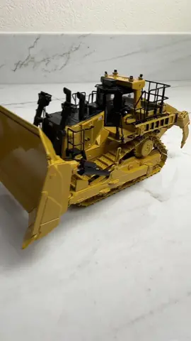 🔥 Introducing the Caterpillar D11 Next Gen Track Type Tractor – a symbol of innovation, strength, and precision in bulldozing excellence. 🌍💪 This scale model is a tribute to the iconic D11, showcasing the cutting-edge technology and design that define the next generation of track-type tractors. 🚜✨ From massive excavation projects to shaping landscapes with finesse, the D11 Next Gen sets a new standard in bulldozer performance. 🏗️🔧 Whether you're a construction professional or simply fascinated by powerful machinery, this miniature masterpiece deserves a spot in your collection. 🌐🚧 #Bulldozer #D11NextGen #HeavyEquipment #Construction #Powerhouse #ScaleModel #CaterpillarD11 #Bulldozing #ConstructionMachinery #MiniatureMarvels
