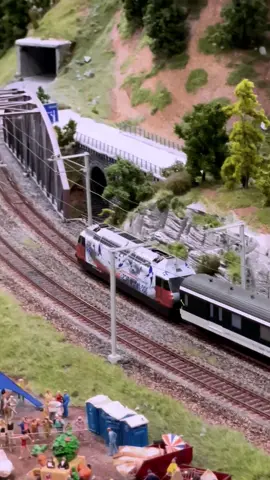 #sponsored Train passing funfair #modeltrains #modelleisenbahn #miniature #modelrailroad
