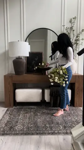 Creating a peony moment here in my entryway✨ These faux florals lend themselves perfectly for laying and draping over a bowl. A cute romantic look✨ Click link in bio to shop my LTK! Happy Friday friends!  #homedecor #modernorganic #ltkhome #fauxflorals #consolestyling 