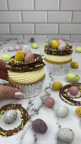 Chocolate sprinkle stacked nests 🍫🐥🪹 I was thinking of ways to make nests to sit top of my cupcakes that weren’t made from buttercream... and here we are 💁🏼‍♀️💗  You can’t go wrong when making these, as the messier the piping, the more real they look. It’s actually fun piping the circles of chocolate Add the sprinkles before chilling them in the fridge. When stacking the nests I added a small amount of melted chocolate between each layer to secure them 🍫🪹  Fill them with @cadburyaust mini eggs and you have the perfect #easter cupcake 🐥🐰💗 #cupcakes #cupcakeart #cakedecorating #easter #eastertreats #bakinginspo #cakedbyrach #tutorial #nest