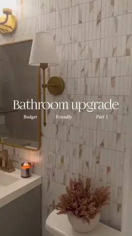 Easiest way to upgrade your bathroom peel and stick tile❤️😍😍#stickgoo #homedecor #bathroommakeover #bathroomdecor #womenday #peelandsticktile #walltile #backsplash 