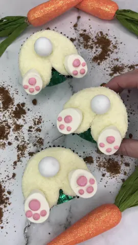 🐰Turning cupcakes into… Bunny butts 🐰 Shaping cupcakes using marbles #bakinghacks Fill your liners half full. Use marbles to shape your liners. Bake and cool. Use tip 1A to pipe buttercream in the shape of a bunny butt 🐰🩷 Press into desiccated coconut 🥥 Cut marshmallows in half for the feet and pink candy melts for the pads 💗 I used white chocolate balls for the tail 🐇 #cupcake #bunnybutt #easterbaking #cutebaking #cakedecorating #cakedbyrach  #caketok 