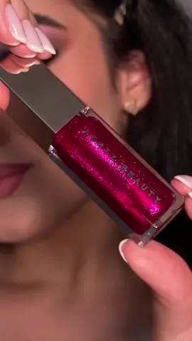 The fuchsia is flexin’ again 💖 Das right, boos! We just restocked 🌟 @Ana Gabi is swipin’ on our shimmering holographic deep fuchsia #GLOSSBOMB in ‘Fuchsia Flex’ 🪩 This is THE ultimate stop-everything, gotta-have-it lip gloss with explosive shine that feels as good as it looks 👄 Tap the 🔗 in bio to cop this stunnin’ shade before it sells out again! ✨