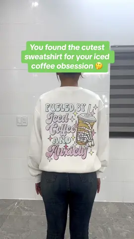 Fueled by iced coffee and anxiety super comfortable I get compliments on it constantly! #coffee #coffeesweatshirt #coffeeandanxiety #anxiety #icedcoffeeandanxiety #sweatshirt #coffeetiktok #TikTokMadeMeBuyIt #viral #viraltiktok #fyp 