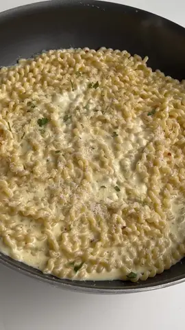 This Creamy Lemon Pasta by @TheseCarbsDontCount is the perfect pasta recipe to make during these last few weeks of peak lemon season! 🍋  After all, when life gives you lemons…make pasta. Or at least that’s our motto. Full recipe below: 1/2 lb fusilli lunghi pasta 3 tbsp butter Dash of olive oil 3 cloves minced garlic 1.5 cups heavy cream Salt, to taste Pepper, to taste 1 tsp each: onion powder, garlic powder, dried parsley, chili flakes Juice of 1 lemon 2 oz cream cheese, softened 1/2 cup parmesan, freshly shredded Reserved pasta water 1. Cook pasta in salted water until al dente.  2. In a pan over medium heat, add your butter, olive oil, and garlic. Cook until garlic is fragrant, about 30s.  3. Pour in heavy cream and bring to a simmer. Season with salt, pepper, onion powder, garlic powder, parsley, and chili flakes. Stir in the lemon juice. 4. Add softened cream cheese and stir until melted. Add in your cooked pasta, parmesan, and a dash of pasta water. Mix until pasta is coated and creamy. 5. Top with more parm & lemon juice. Enjoy!  #feedfeed #lemonpasta #lemonseason #wintercitrus #lemonpastarecipe #creamylemonpasta #pastaallimone #pastatok #EasyRecipe #EasyRecipes #pastarecipe #easypastarecipe 