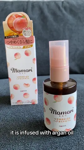 Introducing Momori’s Peach Hair oil serum. It has a lightweight and non-sticky consistency and has a lovely peach scent. Watch to learn more about this hair oil serum!! 🍑🍑🍑 #japanhaul  #momoripeachhairoil #hairoil #japaneseskincare  #japantiktok #silkyhair #heatprotectant #serenebeauty #momoripeach #haircare #haircareroutine #hairserum 