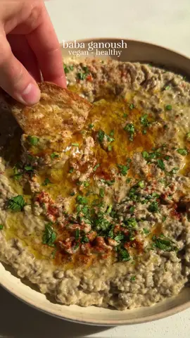 This is the 5th and final episode of my Mediterranean mini recipe series, and I saved the best for last! My all-time favorite dip: homemade baba ganoush! 🍆✨  If you’re craving a healthy creamy and flavorful dip to snack on, you’re in the right place! It’s a classic Middle Eastern dip for a reason :) Smoky roasted eggplant, creamy tahini, lemon juice, and a hint of garlic all blended together into pure perfection. And don’t forget about the crispy pita chips! This combo is going to BLOW YOUR MIND🤤 . . . . . #eggplant #pita #healthysnack #mediterraneanfood