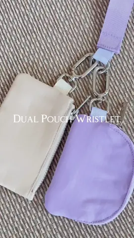 The cutest little dual pouch wristlet in a pretty lavender & beige color. Love that i can remove these pouches and attach them to my belt bag or put inside my purse, etc! So many cute colors to choose from and such a great price ✨✨ 