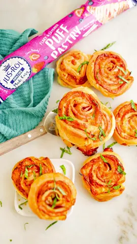 #ad Breakfast Pinwheels with ham and cheese are a cinch to make with @jus_rol_northamerica puff pastry because there is no need to wait for the dough to thaw, just unroll and go! Look for #jusrol #puffpastry in the refrigerator section at your local grocery store! #amazingmadeeasy  INGREDIENTS 1 sheets Jus-Rol puff pastry 6 slices thinly-sliced, quality deli ham 1 cup freshly grated gruyere 1.5 tablespoons Dijon mustard chopped fresh herbs, optional INSTRUCTIONS 1. Unroll the puff pastry and spread with the mustard. 2. Layer the ham and cheese on top. 3. Tightly roll up the puff pastry into a log. Wrap in the parchment paper. 4. Chill for 20 minutes in the fridge. 5. Unroll the parchment and use it to line a baking sheet. 6. Slice the puff pastry log into equal pieces and place each flat on the baking sheet. 7. Bake for 15-18 minutes at 375F until golden brown. 8. Serve warm or room temperature with chopped fresh herbs if desired.