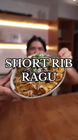 Short Rib Ragu 🍝🙌 INGREDIENTS:  Sauce:  - Carrots, Celery, Onion (¾ cup, finely sliced) - Garlic (8 cloves, sliced) - Tomato Paste (2 tbsp) - Red Wine (1 cup)  - Tomato Sauce (700 ml, Passata) - Beef Stock (2 cups) Short Ribs + Pasta - Beef Short Ribs (Use about 1 kg): - Salt and Pepper (To taste) - Fettuccine (Or pasta of your choosing) - Grated Parmesan (To Taste) - Parsley (for Garnish) Bouquet Garni: - Rosemary, Thyme, Sage, Bayleaf (Tied together by butchers twine) Instructions - Season your beef short ribs with salt and pepper, and in a hot dutch oven, give them a hard sear. - Remove beef from the pan, and in the same pan add your chopped carrots, onion, celery, and garlic. Saute for 2-3 minutes and add in tomato paste. - Deglaze with red wine and add in your beef stock. Let simmer for 2-3 minutes.  - Add in your Passata sauce along with your seared beef and your bouquet garni and season to taste with salt and pepper. - Slow cook on low heat for 3-4 hours or until beef is tender.  - Remove beef from sauce and shred. - Add beef back into the mixture and mix well to combine, In a separate pan, add some of your sauce along with your cooked pasta. Add some pasta cooking water and mix well to combine.  - Grate some parmesan cheese over your pasta, serve and enjoy!  #Shortribragu #cookingasmr #asmr