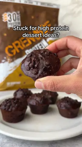 Brb, off to make these Fudged Up Protein Muffins by @Munch.abunch 🤤 How good do they look?! Top tip: heat them for 15-20 seconds before you tuck in👌🏼 Recipe👇🏼 🍌2 ripe bananas (mashed) 🍫18g cacao powder 💪🏼30g @grenadeofficial Fudged Up Protein Powder 🥜120g @munch.abunch Peanut Butter  🍪25g Choc Chips 🥄1/2 tsp vanilla extract 🧁3g baking powder 🧂a pinch of salt 1. Preheat the oven to 180°c 2. In a bowl, add the Protein Powder, cacao powder and a dash of water. Mix until smooth. 3. To your mashed bananas, add the chocolate mixture and peanut butter and mix well. 4. Add baking powder, vanilla extract, salt and chocolate chips and mix again. 5. Spray a cupcake mould with nonstick spray and divide the mixture into 6. 6. Top with more chocolate chips and bake for 10-12 minutes. 7.  Leave to cool and enjoy! #Grenade #GrenadeProtein #ProteinDessert #HighProtein #ProteinPowder #ProteinRecipe #Recipe #Baking #HealthyDessert 