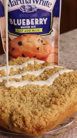 A perfect semi-homemade coffee cake just in time for Easter sunday made with @marthawhite muffin mix!! You will need: 2 bags of Martha White Blueberry Muffin Mix 1 cup of milk 3/4 cup of all purpose flour 1/2 cup of packed brown sugar 2 to 3 tablespoons of butter or margarine Cream cheese frosting (Optional) Total cost $7.50-$8.75 depending on choices Preheat the oven to 350.  Mix blueberry muffin mix with milk and pour into a greased or lined 9x9 baking dish.   Mix flour, brown sugar and 2 tablespoons of melted butter or margarine together until it forms coarse crumbs.  Only add the extra 1 tablespoon if it looks too dry.   Distribute the crumb topping over the prepared coffee cake batter and bake for 35 minutes.  Let cool for 20 to 30 minutes before unmolding.   If desired drizzle with cream cheese frosting (Microwave for 30 seconds to make it pourable) leave this out for a less sweet cake.   #easter  #easterbrunch  #brunchrecipes  #coffeecake  #blueberrycoffeecake  #semihomemade  #marthawhite  #marthawhitepartner