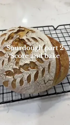 Score and bake my sourdough loaf i made with you guys the other day 🫶🏼🤎 #momof3 #momofgirls #girlmom #twinmom #toddlers #toddlermom #momofmultiples #twingirls #twinsoftiktok #MomsofTikTok #momtok #twinsisters #identicaltwins #viral #fyp #trend #fypage #girlsquad #sahm #ditl #chaos #crazy #messy #slowliving #slowdown #childhood #slowlife #twinlife #momlife #reset #routine  #sourdough #sourdoughjourney #sourdoughtok #sourdoughbaking #sourdoughscoring #bakesourdough