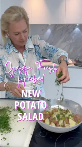 Garden Fresh Herbed New Potato Salad 3lbs small red-skinned new potatoes, well-scrubbed & trimmed ¼ cup apple cider vinegar ¼ cup cold-pressed extra-virgin olive oil 1½ teaspoons salt Freshly ground black pepper 1 cup finely chopped celery 1 cup finely chopped scallions ¼ cup chopped drained cornichons ¼ cup finely chopped fresh dill 2 tablespoons finely chopped fresh tarragon 2 tablespoons finely chopped fresh chives 2 tablespoons finely chopped flat-leaf parsley Set a steamer basket in a pot and add about 1 inch water. Set the pot over medium heat and bring to a simmer. Quarter the potatoes. Add the potatoes to the steamer basket, cover the pot and cook just until tender, about 15 minutes. Transfer the potatoes to a large bowl. While they are still hot, drizzle them with the vinegar and then the oil. Add the salt and a generous grinding of pepper. Toss gently. Add the celery, scallions, cornichons, dill, tarragon, chives and parsley and toss again. The salad is best when served still slightly warm, but it can be cooled and refrigerated overnight if necessary. Return it to room temperature before serving.  (Dress: Marina St. Barths | Watch: @Wintex Milano ) #easter #easterbrunch #easterdinner #easterready #potatosalad #potato #salad #pamelamorgan #flavor #easterrecope #Recipe #recipeoftheday #cooking #foodies #easymeal #EasyRecipe #happyeaster #yum #foodlovers #foodtiktok #recipesoftiktok 