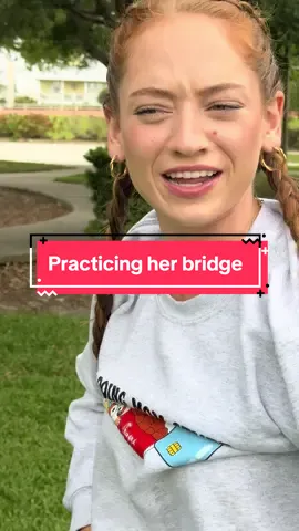 Practicing her gymnastics moves 