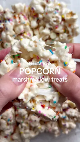 The Viral Popcorn Marshmallow Treats 🍿 Picture this: fluffy popcorn, gooey marshmallows, white chocolate, and colorful sprinkles all rolled into one lilllll shhhhnaaaack that’s guaranteed to put a big ol’ grin on your face 😬 (still not entirely sure if this emoji is a happy smile or nervous smile tbh) INGREDIENTS -  3 tbsp butter 7 cups popcorn 1 tsp vanilla extract 1 scoop cake batter protein powder 50 regular size marshmallows Funfetti sprinkles DIRECTIONS -  1) Start by popping your popcorn kernels using your preferred method. Stale popcorn also works here.  2) In a large saucepan, melt some butter over low heat. Once melted, add in the marshmallows and stir until they’re completely melted and smooth. 3) Remove the marshmallow mixture from the heat and stir in a splash of vanilla extract for extra flavor. Then add the protein powder and pour the melted marshmallow mixture over the popcorn and gently toss until all the popcorn is evenly coated. 4) Now comes the fun part—adding the sprinkles! Sprinkle them over the popcorn mixture and give it a final toss to distribute the sprinkles evenly throughout. 5) Transfer the popcorn mixture to a parchment-lined baking dish or sheet pan. Using a spatula or your hands (lightly coated with cooking spray to prevent sticking), press the mixture firmly into the pan to shape it into a flat, even layer. 6) If desired, melt white chocolate then drizzle it over the top of the treats for an extra special touch. Can add extra sprinkles on top as well. 7) Allow the treats to firm up for about 30 minutes at room temperature. Once cooled, cut them into squares or break them into clusters and get ready to enjoy a burst of fun and flavor in every bite! For all tips and tricks head to the blog post https://basicswithbails.com/course/dessert/funfetti-marshmallow-popcorn-treats/ #marshmallowtreats #funfettimarshmallows #popcornricekrispies #easydessert #DessertRecipes #fundessert 