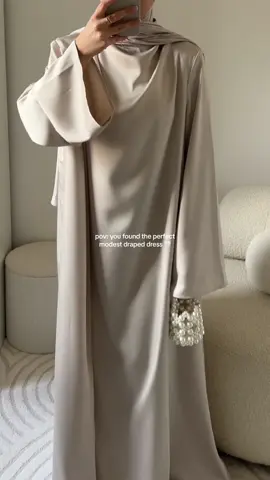 The drape detail on the dress 🤌 #modestwear #modestfashioninspo #modestclothing #modestfashionblogger #abayastyle #TikTokFashion #abayagirls @Merrachi 