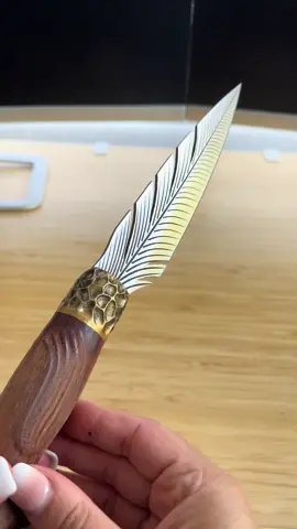 This japanese feather knife is forged in fire 🔥 I’ve never seen a knife this detailed and I’m here for it 🙌🏽 #knife #kitchengadgets #cookingtiktok #japaneseknives #ttsacl #ttshop #fypviral #tiktokshopfinds #rococo 