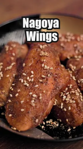 The Nagoya style Japanese chicken wings are great as a snack or an appetizer, full of umami! [Ingredients] Chicken wings (5 used in video) Assorted salt, flour 2 tbsp soy sauce & mirin 1 tbsp sake & sugar 1 clove grated garlic Assorted peppers, sesame 1.  Cut off tip and drums from wings (ok to use whole wing) 2.  Add salt then squeeze, cover in flour. 3.  Fry at 320 degrees until they have a light golden color (2 to 3 minutes). 4.  Let it rest for 5 minutes. 5.  Make sauce by mixing soy sauce, mirin, sake, sugar, garlic.  Mix & boil. 6.  Fry at 355 degrees, move it occasionally, ready when they float & golden. 7.  For both sides, brush on sauce, add lots of peppers & sesame.   Enjoy! #chickenwings #japanesefood #cooking #Recipe #fyp