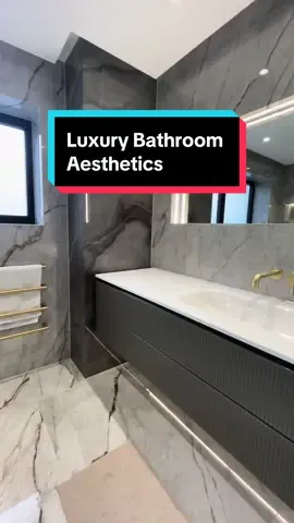 A luxury bathroom featuring the Palace Grenio polished alongside the Aspiration Cocao polished feature wall tile slabs.   #bathroom #bathroommakeover #bathroomdesign #bathroomdecor #bathroomrenovation #bathroomremodel #interiordesign #tile #tiles #bathroomtiles #ensuite #ensuitebathroom 