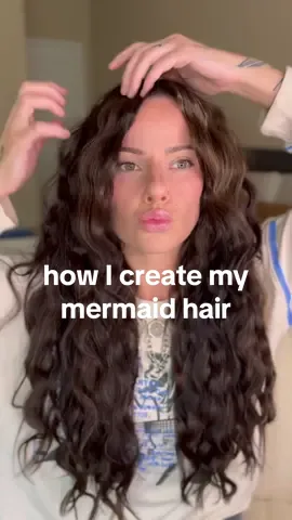 Replying to @Chelseaaaaaa the vibes are Aquamarine after dark I think? so grateful to @Anna Watson for the extensions, color and cut that made me love my hair more than I ever have in my life. Wave tool is from @Bed Head by TIGI. Hairspray and texture spray are both by @KEVIN.MURPHY and this top is from @Daydreamer LA #hairtutorial #mermaidhair #wavyhair #hairextensions #extensions #curlyhair #grwm 