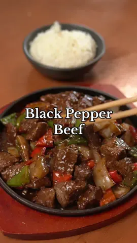 Black Pepper Beef Ingredients Beef+marinade * 1.5 lbs beef filet mignon(cute into bite sized cubes) * 2 tbsp Shaoxing wine * 1 tsp soy sauce * 1/4 tsp salt * 1 tbsp cornstarch * 1 tbsp neutral oil Sauce * 1/2 cup beef stock * 1 tbsp light soy sauce * 1 tsp dark soy sauce * 1 tbsp oyster sauce * 1 tbsp ketchup * 1 tsp sugar * 1/4 tsp msg * 2 tbsp black pepper * 1/2 tsp Sichuan peppercorn powder * 1/2 tsp white pepper * 2 tsp cornstarch Rest of ingredients * 4 tbsp neutral oil * 1 red bell pepper * 1 green bell pepper * 1/2 onion * 3 cloves garlic(minced) * 1 tsp ginger(minced) * 1 tsp sesame oil Instructions 1. Cut beef into cubes and marinade with ingredients. 2. Prepare vegetables by chopping bell peppers and onions into petals and finely mincing ginger and garlic. 3. Combine sauce ingredients in a bowl. 4. Heat 2 tbsp of oil in a hot wok and sear beef for 3-4 minutes making sure the beef has a nice crust. 5. Remove beef and add more oil to the wok. Sauté the garlic, ginger, and vegetables until slightly translucent(2 minutes) then add back the beef and the sauce. 6. Once thickened finish with sesame oil and enjoy. #blackpepperbeef #EasyRecipe #30minutemeals #Foodie #Recipe #cooking #recipetutorial #cookingtutorial #recipevideo #cookingvideo #beef #fastmeals #quickrecipes #quickrecipeideas 