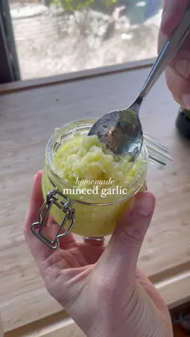 Make your own jar of minced garlic! An easy way to have fresh garlic on hand throughout the week without having to constantly mince.  Peel your cloves of garlic and add them to a food processor. Then pour in enough olive oil to coat - I had 3 bulbs of garlic and used about 1/3 cup of oil. Pulse in the food processor until finely minced then transfer to an airtight container in the fridge for up to a week.  To store longer term, freeze the garlic in teaspoon size pieces then add to a container and keep in the freezer.  #garlictips #mealprephacks #foodprepideas 