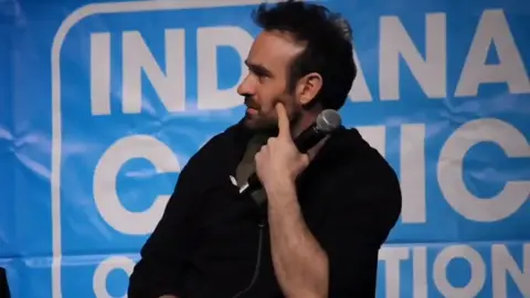 Charlie physically cringing when someone called him good-looking 😂 he's so shy and cute He really went '😬' he's still horrified of compliments to this day lmao #CharlieCox #IndianaComicCon 2024