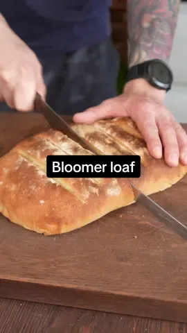 From Scratch ep 22: BLOOMER LOAF 🍞 Super simple yet SUPER EFFECTIVE & DELICIOUS 🔥 1. Mix 500g bread flour (plain will work), 310g warm water, 45g olive oil, 7g instant yeast, 8g salt 2. Mix and then tip out onto a floured work surface & knead for 10 mins until you have a smooth ball 3. Oil up your bowl, add you dough ball, cover and leave for an hour whilst it doubles in size 4. Punch out the air, knead for a minute or so and then shape into an oval shape and add to an oiled up baking tray 5. Sprinkle over flour and cover with a tea towel and leave for another hour to double in size 6. Add a tray with water to the bottom of your oven at around 200 degrees C 7. Then add your bread once your oven is pre heated & go for about 20 mins agter you’ve sprayed the oven with water 8. Flip it around and add back for 10-20 mins depending on your desired colour! 9. Take out and leave to fully cool! THEN ENJOY #homemadebread #simplebread #breadrecipe #fromscratch 