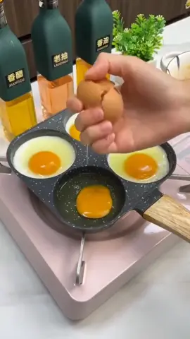 The eggs fried in this pan are all shaped, so it is very convenient to fry four in one pan. #food #eggs #breakfast #pan #fried 