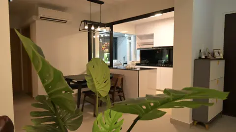 A cozy living room and kitchen 😍 #interiordesigner #interiordesign #toapayoh #singapore #fyp #sg #midcenturymodern #furniture #vintage #retro #concrete #homedecor #renovation #renovationsg #house #interiorstyling #colours #singapore #renosg #bohemian #living #tips #ideas #vintagehome #midcentury #company #design #resale #hdb #bto 