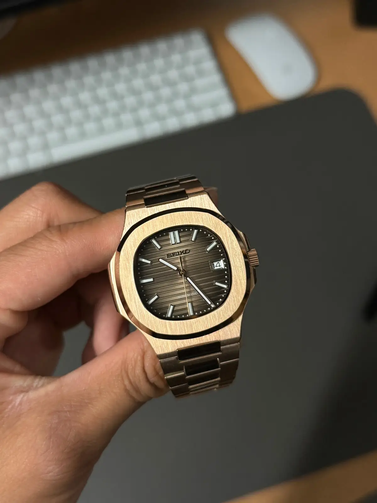 Had to keep this for the personal collection🤩 What do yall think of this rose gold SeikoNaut with the mocha dial☕️ DM if you’re interested in customizing a timepiece today ✅ #seiko #seikomod #customwatch #watch #royaloak #WatchCollection #automaticwatch #seikocollector #timepiece #seikomodder #watchgame #customseiko