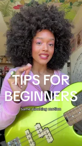 Tips for beginner bass players! 🎸🌸 These are a few things that were extremely helpful when I first started:  1️⃣ Take your hand and make a pinching motion, this is how you’ll move through the string ➡️➡️➡️ 2️⃣ Alternate fingers to develop speed. ⚡️ Now just set down your hand.  3️⃣ People don’t understand 🗣️ a lot of beginner bass guitar players think you have to put your thumb on your pickup. I prefer to combine that with putting my on different strings depending on what feels best for the song I’m playing. 4️⃣ For my beginner bass students, I suggest you start with your thumb on the pickup because that’ll get you really far ✅ 5️⃣ As for your fingers 🚫 don’t think about plucking the string in terms of pulling up or pushing down. 6️⃣ Instead, pinch your fingers through the string toward your thumb 💕 7️⃣ Alternate fingers, start slowly, making each sure each note sounds beautiful ✨ 8️⃣ Gradually increase your speed—as you are able to make each note ring clearly.  9️⃣ Remember to breathe and smile when u stumble, and keep jamming on bass guitar.  You’ll only improve as time goes on💕 🔟 Need more bass guitar in your life? ⭐️🍒 Tap my pinned video if you want to become a bass baddie! ⬅️ 🎸🎸🎸🎸🎸🎸 Thanks @emma who ? for giving me the idea to make this tutorial :) love ya!!  💕💕💕 #bassguitar #bassguitarlessons #bassguitarist #basslessons  #firstbasslesson #beginners 