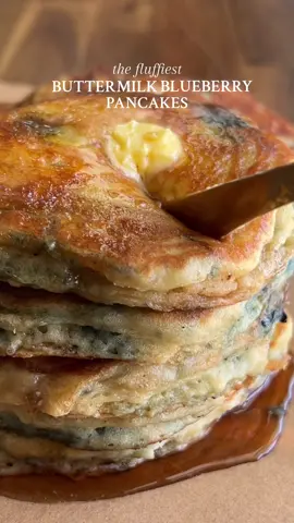 BUTTERMILK BLUEBERRY PANCAKES If @The Rock is having these this weekend…I think you and I should be too 🤭😏 Truly, the best pancakes I’ve ever made — and I promise it’s for good reason 🤌 They’re beyond fluffy, soft, golden, and bursting with blueberries 🫐Recipe below OR go to my website through the link in my bio 🤎 #Recipe Details (makes 12-16): Ingredients: - 2 1/4 cups buttermilk (sub: 2 tbsp apple cider vinegar or lemon juice + 2 1/4 cups milk of choice, whisked together) - 2 eggs - 1/4 cup (1/2 stick) unsalted butter, melted and slightly cooled - 2 tsp vanilla extract - 3 tbsp granulated sugar - 2 1/4 cups all-purpose flour @Bob’s Red Mill  - 3 tsp baking powder - 1 tsp baking soda  - 1 tsp salt - 1 cup fresh or frozen blueberries Optional Toppings: - Butter @KerrygoldUSA  - Maple syrup Instructions: Start by making the pancake batter. In a large bowl, whisk together the buttermilk, eggs, melted butter, and vanilla extract until well combined. *If you are using a homemade buttermilk mixture of vinegar and milk, make that first and let it sit for 1-2 minutes before adding the rest of the wet ingredients. Add in the granulated sugar, flour, baking powder, baking soda, and salt. Whisk until just combined, it’s okay if there are a few small lumps in the batter. Let the batter rest for 10 minutes. Heat a large nonstick skillet over medium heat and grease with butter. Use a 1/3 measuring cup to pour the batter onto the pan for each pancake. Then, arrange a small handful of blueberries on top of each. Cook until little bubbles form and the edges start to firm up. Then gently flip to cook the other side until golden brown, cooked through, and fluffy (~2-4 minutes on each side). Plate and serve the pancakes warm with butter and maple syrup, if desired. Enjoy! #blueberry #pancakes #buttermilk #buttermilkpancakes #blueberrypancakes #pancakerecipe #breakfast #fluffypancakes #maplesyrup #butter