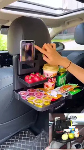 The small table in the back of the car can put a water cup of mobile phone snacks, and can be folded up when not in use, and it is much more convenient to sit in the back row and eat snacks#Car folding table#Small dining table in the back of the car#fyp #tiktok 