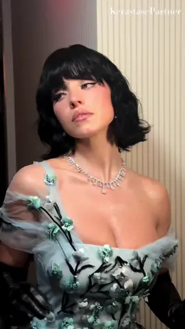 GETTING READY FOR MET w/ @Kérastase 🖤 Hair by ME 🙋🏻‍♂️ Makeup: @Melissa Hernandez Styled: @mollyddickson in @Miu Miu #kerastasepartner   PRODUCT BREAKDOWN:  To prep Sydney’s damp hair, I directly applied Kerastase Serum Extentioniste on the scalp and massage it in. Create a center part, apply Kerastase Elixir Ultime from roots to ends.  Start to wrap the hair around flat on the head, brush as you go with mason pearson, secure with clips.  Apply the wig, secure with hair pins around the nape of the neck. Cut to desired length that will complement the face shape.  Dampen the wig with water, apply Kerastase Premiere Serum Filler for a little glide to the hair before cutting to desired length. Then add Kerastase Mousse Bouffant and air dry for a natural wavy texture.   To dry the bangs use blow dryer and a round brush. Set the dryer to medium heat and direct the dryer down the cuticle of the hair to smooth.  Set the iron to 390 degrees to create the texture use  flat iron. Go back and forth to create flat waves.  To finish the look, spray Kerastase Laque Extreme Hair Spray and some Kerastase Elixir Ultime hair oil for a boost of shine for the red carpet! #METGALA2024 #sydneysweeney #sydneysweeneymetgala2024 #hairtutorial 