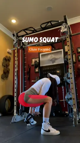 Glute Focused Dumbbell Sumo Squat Tips: 1. Take a stance 1.5 to 2 times wider than shoulder width. 2. Point toes outwards and slightly lean forward for more tension on the glutes. 3. Keep chin down to maintain a neutral spine. 4. Engage lats by keeping shoulder blades down. 5. Position weights underneath lats, not shoulders. 6. Open up knees to align with toes during squat. #gluteworkout #gymrat #gymgirl #gymtips #quad #squat #fyp #gymmotivation #legday 