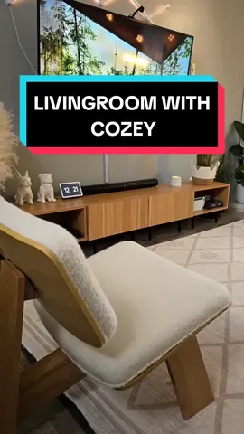 Cuddled up in my living room oasis thanks to @Cozey   furniture.  #ad Their pieces are the perfect blend of style and comfort – seriously, I could sink into this sofa all day long. Everything feels so light and airy, it's the perfect place to relax and unwind.   If you're looking for furniture that makes your home feel cozy and inviting, you gotta check out COZEY!  #cozey #cozeyliving #homedecor #livingroom #cozeylife #cozeyhome #homeoffice #homedecor #setupinspiration #cozy #comfy #chill #chillvibes #homedesign #homesweethome #furniture  #comfort #livingroomdecor 