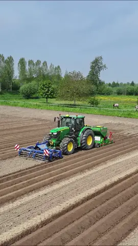 Planting potatoes in one pass with John Deere 6150R +Baselier combi planter + VSS front preparer  Video on YouTube:AgriDroneFly #johndeere #johndeere6150r #vss #potatoes #baselier #planting #onepass #satysfying #tractor #landbouw #poah #fy #fyp #viral #tractorspotter #akkerbouw #agri #agriculture #agricultura 