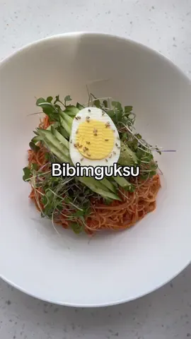Bibimguksu Sauce Recipe (1 servingh - 1 tbsp gochujang - 1 tbsp soy sauce - 1 tbsp of gochugaru - 1 tbsp of sesame seed oil - 1/2 tsp of sugar - 1 tsp of rice wine vinegar (optional) - kimchi (optional) - sesame seeds (for garnish) - cucumbers (for garnish)   #koreanfood #koreannoodles #coldnoodles #bibimguksu #koreanamerican #korean #noodles #asianfood #cookwithme #EasyRecipes 