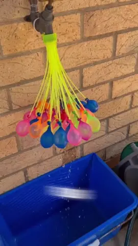 Self filling amd sealing water balloons. #Summer #fun #waterballoon #waterfight #fyp 