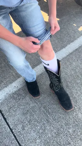 I grabbed the wrong pair of jeans, they weren’t his #wrangler bootcut but walked around the pickup to see Jacob doing this little hack and had to film him. Ok, kiddo!! #boothack #westernwear #western #boothack #cowboy #bootcut #wranglerjeans 