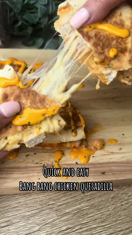 Quick and easy bang bang chicken quesadilla  . ⬇️ Recipe below ⬇️  . Press save for dinner inspiration 📌 follow @dinner_at_hols for more dinners like this.  . Recipe makes 1  . Ingredients  . 125g cooked chicken  1-2 spring onions, sliced  2tbs mayo, I used @hellmans lighter 1tbs sweet chilli, or to taste  1tbs sriracha, or to taste  30g cheese - I used mozzarella.  1 wrap  Sriracha mayo and parsley to garnish (optional)  .  Method  .  Pop all the ingredients apart from the cheese and wrap into a bowl and mix, place it all on one half of the wrap and sprinkle with the cheese. Fold the wrap and toast in a pan till it’s golden. Serve and enjoy.  . Calories- 464 Protein - 45.3g  . . . #fypシ #fyp #viral 