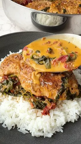 Marry Me Chicken  Creamy delicious and easy marry me chicken. I love this with white rice, mashed potatoes or serve it over pasta.   —Ingredients— 2 chicken breasts cut in half lengthwise  1 teaspoon salt  1/2 teaspoon paprika  1/2 teaspoon garlic powder  1/2 teaspoon onion powder  1/2 teaspoon black pepper  1/2 teaspoon thyme  1/2 teaspoon oregano  1/4 teaspoon cayenne pepper  3 tablespoons olive oil  1 tablespoon butter  1 medium size onion chopped  4 cloves garlic minced  1 cup sun dried tomatoes chopped  1 cup chicken broth  1 cup heavy cream  1/2 teaspoon paprika for the sauce  1/2 teaspoon chili flakes for the sauce  1/2 teaspoon Italian seasoning for the sauce  1 cup grated Parmesan cheese  8oz spinach  Parmesan cheese for grating on top when serving  1. Cut each chicken breast in half horizontally.  2. In a small bowl mix together the spices for the chicken, 1 teaspoon salt, 1/2 teaspoon of each paprika, garlic powder, onion powder, black pepper, thyme, oregano and 1/4 teaspoon of cayenne pepper.  3. Season the chicken with the spice mixture on both sides.  4. Put a large skillet on medium-high heat, add in oil and butter. Add in the chicken and cook for about 4 minutes per side or until golden on both sides. Remove chicken from skillet and Transfer to a plate.  5. Add the onion and garlic to the same skillet and cook until fragrant, about 1 minute. Stir in the sun dried tomatoes and cook for another minute.  6. Pour in the chicken broth, heavy cream and season with 1/2 teaspoon of paprika, Italian seasoning, chili flakes and give it a quick stir. Add in the crated Parmesan cheese and stir again until fully incorporated.  7. Add in spinach and cook until the spinach wilts. Reduce the heat to medium-low, Return the cooked chicken back to the skillet. Nestle the chicken in the sauce. Cook until the sauce thickens and thoroughly coats the chicken (about 5 minutes). 8. Sprinkle with grated Parmesan cheese, serve and enjoy!  #marrymechicken #chickenrecipe #homemade #tasty#fav #chickendinner #made #with #Love 