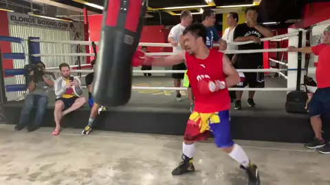 Manny Pacquiao hitting the heavy bag