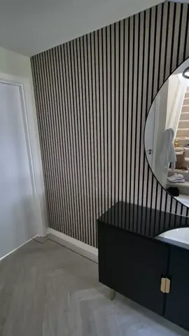 Beapoke LED strip design in a slat panel feature wall ⚡️ #slatwall #slatpanels #ledstrips #ledtape #featurewall #leddesign #lightingdesign 