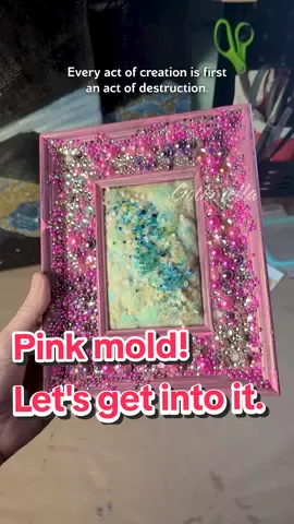 But why Pink mold? a rare behind the art video! 💞🌌 Generally my art pieces are made first because I want to try a new material or technique and devise an art piece to fill the need but this was one of the rare instances where the idea for the piece came first with the only consideration being what I already had on hand (So I didn't want to get new stuff to make this) . Though admittedly, the very first iteration of this piece was pretty much i wanted to wreck i mean fill one of my reclaimed/ dumpster frames for fun. Though admittedly originally it was a super saturated hot pink frame covered fully with the pink pears and  a super saturated neon green center with a pink foil radiation sign lol. so it changed a bit through the conception phase 😂💞🌌 As far as why I don't typically make these explainer-y videos (which if you'd like more please let me know in the comments) is because I think my personal meaning should be thought of like fun trivia that maaaaaybe informs what you think about the piece but is in no way more important than, whatever the first thing you thought when you saw the art piece was and whatever thought trails come from that. And I would hate for my relatively poor explanation of my intent upon the pieces inception to limit whatever that initial value you might have gotten from the piece could have been So again, hopefully you think of this video more like fun trivia than artistic gospel 🖤. And take whatever value or interest is of use to you from this and toss out the rest 😂💞  #art #artist #bedazzled #rhinestones #pinkmold #moldy #moldyart #moldart #abstract 